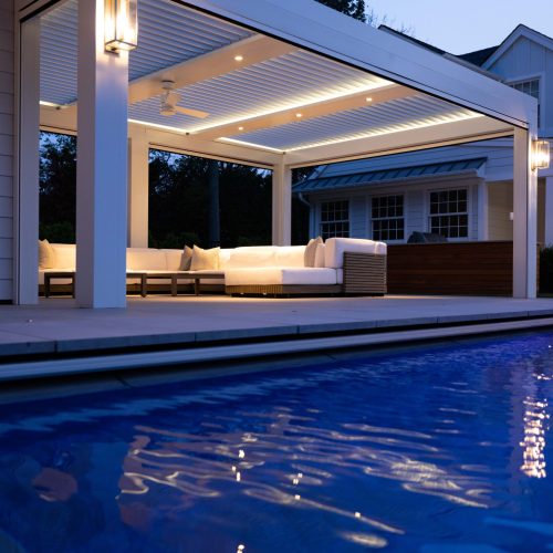 Bromic*2023, Long Island, New York, Pergola X, backyard, lights, night, pool, residential, white louvers, white posts
Coastal Construction - Long Island